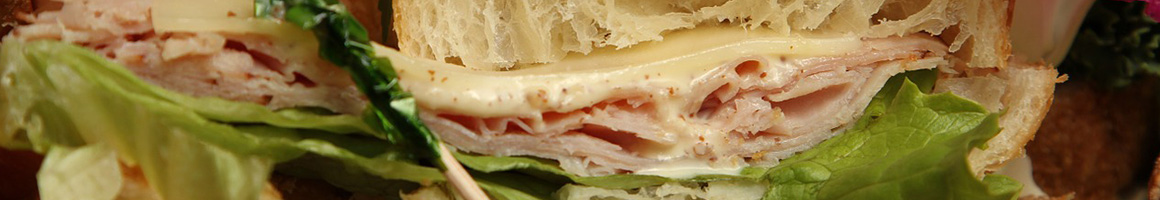 Eating Sandwich at Sports Deli restaurant in Reno, NV.
